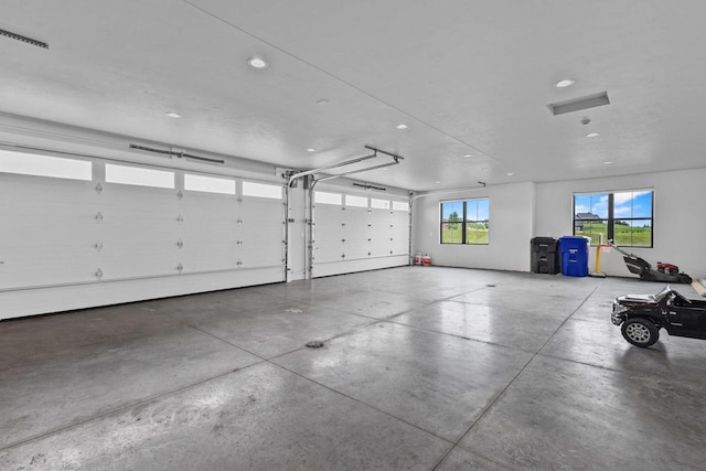 7205 N Trinity Ct, Appleton, WI 54913 - garage featuring recessed lighting