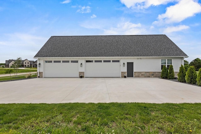 7205 N Trinity Ct, Appleton, WI 54913 - view of home's exterior featuring driveway, an attached garage, roof with shingles, and a lawn