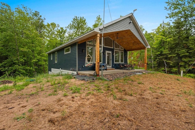 3838 Bear Lake Ln, Laona, WI 54541 - view of front of property with a patio area