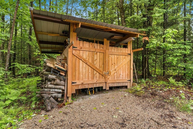 3838 Bear Lake Ln, Laona, WI 54541 - view of outdoor structure with a wooded view