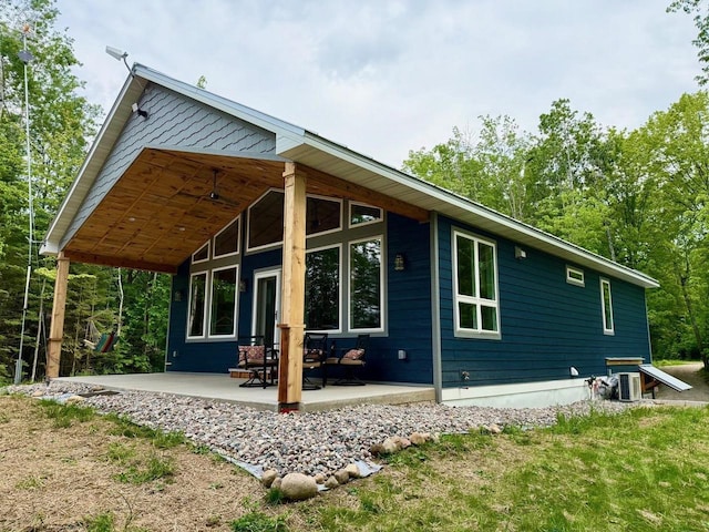 3838 Bear Lake Ln, Laona, WI 54541 - rear view of property featuring a patio area