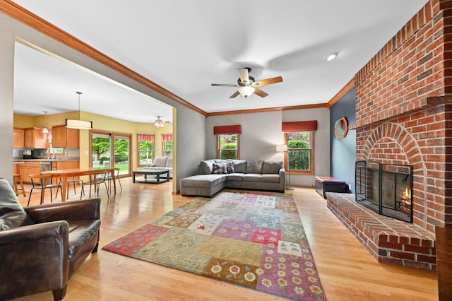 20750 Chadwick Ln, Brookfield, WI 53045 - living area featuring ceiling fan, a brick fireplace, ornamental molding, and wood finished floors