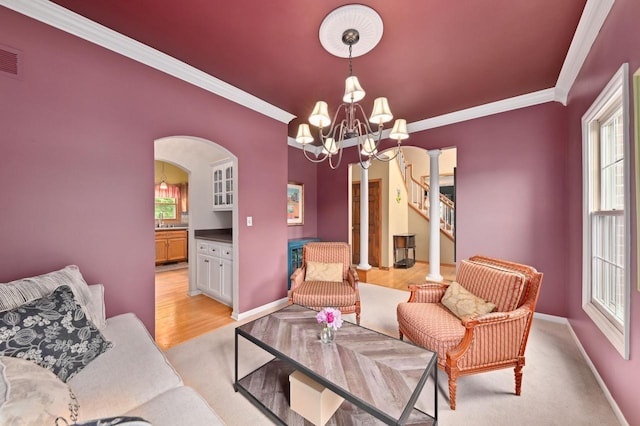 20750 Chadwick Ln, Brookfield, WI 53045 - living area with crown molding, arched walkways, and a chandelier