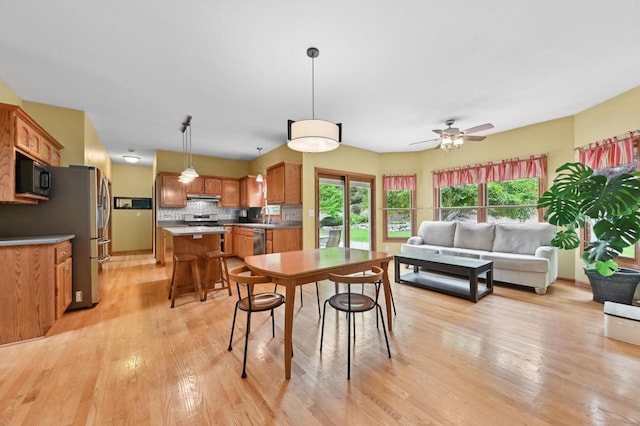 20750 Chadwick Ln, Brookfield, WI 53045 - dining area with light wood-style flooring and ceiling fan