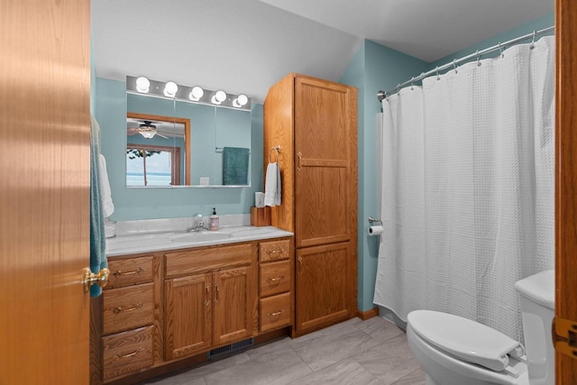 N7861 Lakeshore Dr, Fond Du Lac, WI 54937 - bathroom with vanity, vaulted ceiling, and ceiling fan