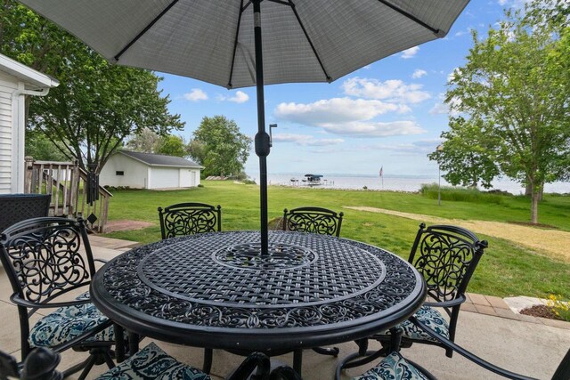 N7861 Lakeshore Dr, Fond Du Lac, WI 54937 - view of patio / terrace featuring a water view and outdoor dining area