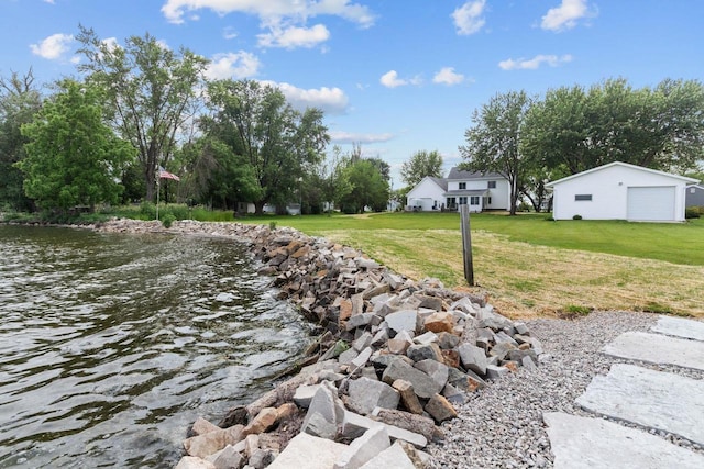 N7861 Lakeshore Dr, Fond Du Lac, WI 54937 - view of green lawn with a detached garage and a water view