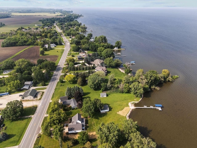 N7861 Lakeshore Dr, Fond Du Lac, WI 54937 - aerial overview of property's location featuring a large body of water and a tree filled landscape
