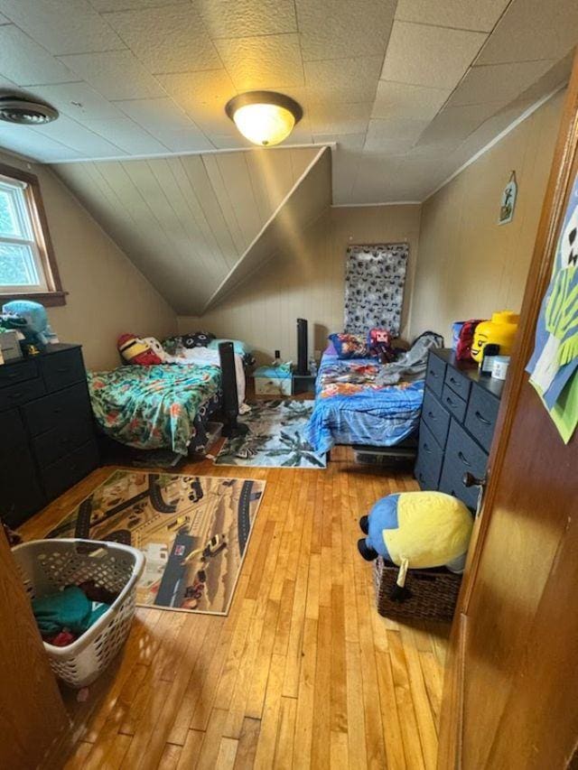 1820 Plymouth St, Oshkosh, WI 54901 - bedroom with hardwood / wood-style flooring and lofted ceiling