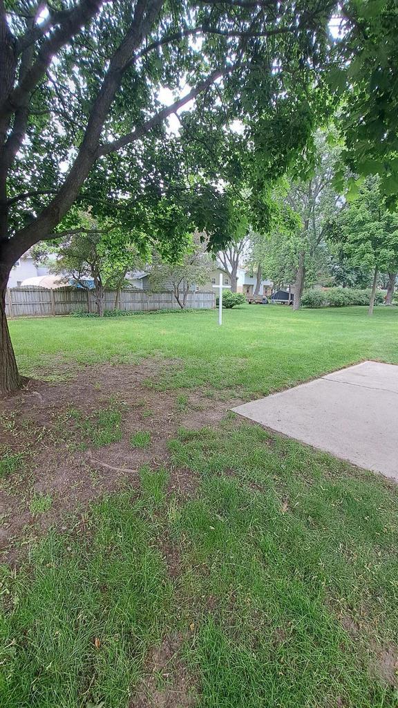 752 Imperial Ct Unit 754, West Bend, WI 53095 - view of yard with a patio area