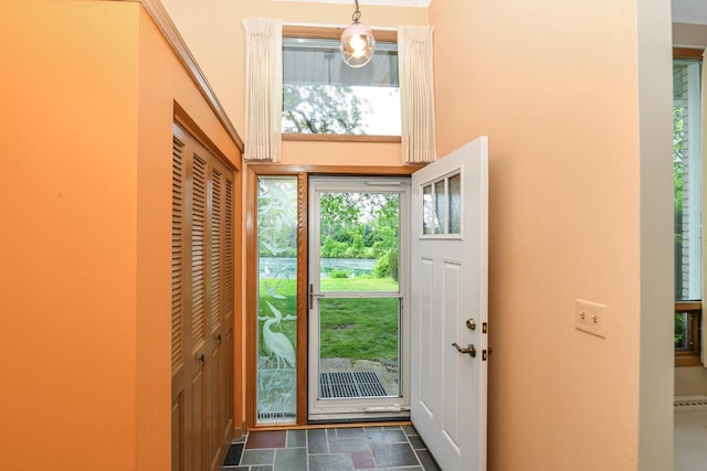 12929 N Colony Dr, Mequon, WI 53097 - entryway featuring dark stone finish flooring