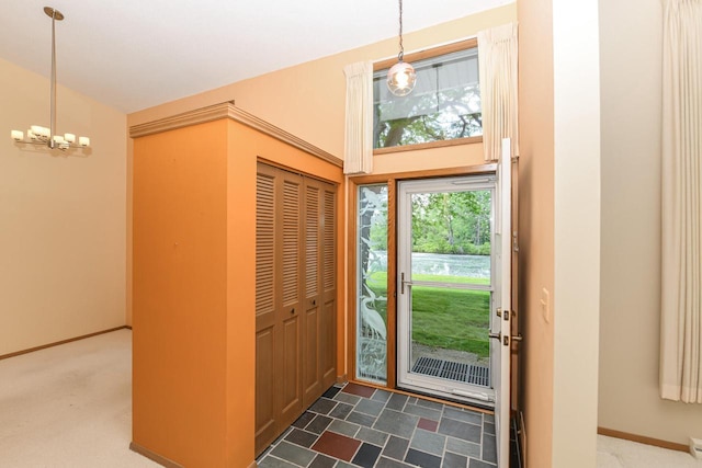 12929 N Colony Dr, Mequon, WI 53097 - foyer featuring a chandelier and baseboards