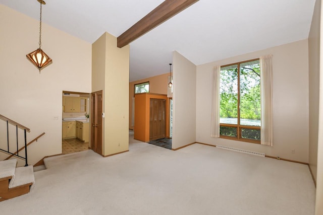 12929 N Colony Dr, Mequon, WI 53097 - unfurnished living room featuring carpet floors, stairs, beam ceiling, baseboard heating, and high vaulted ceiling