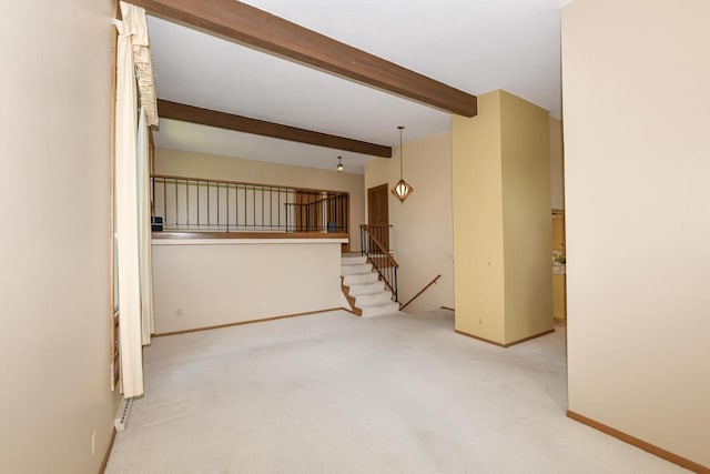 12929 N Colony Dr, Mequon, WI 53097 - unfurnished living room with carpet floors and beamed ceiling