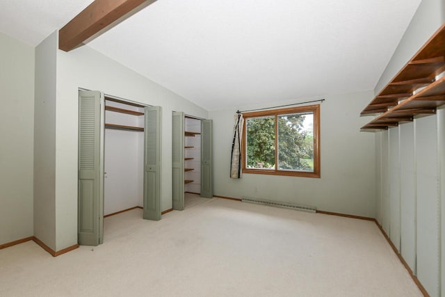 12929 N Colony Dr, Mequon, WI 53097 - unfurnished bedroom featuring light carpet and a baseboard radiator