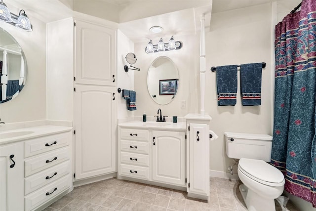 2213 Sunrise Dr, Appleton, WI 54914 - full bath featuring two vanities, tile patterned flooring, and a shower with curtain