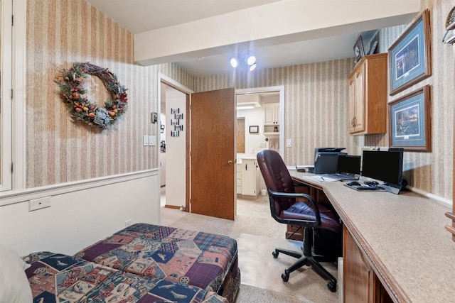 2213 Sunrise Dr, Appleton, WI 54914 - bedroom with wallpapered walls, an office area, ensuite bath, and light carpet