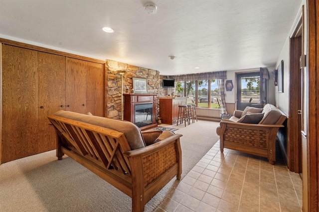 2213 Sunrise Dr, Appleton, WI 54914 - living area featuring light carpet, a large fireplace, and light tile patterned floors