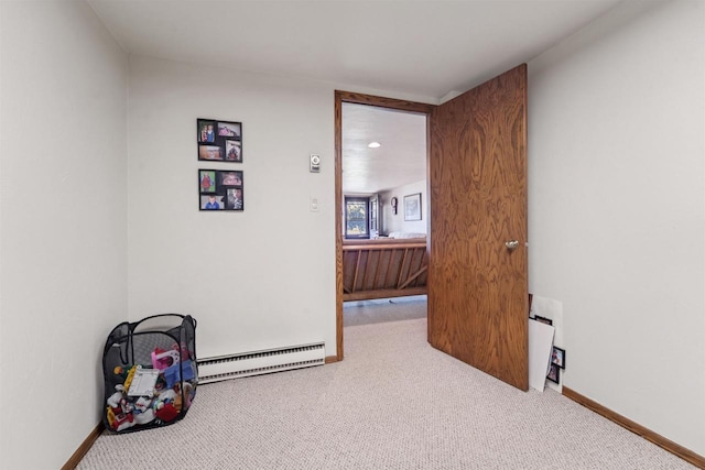 2213 Sunrise Dr, Appleton, WI 54914 - unfurnished room featuring a baseboard heating unit and carpet