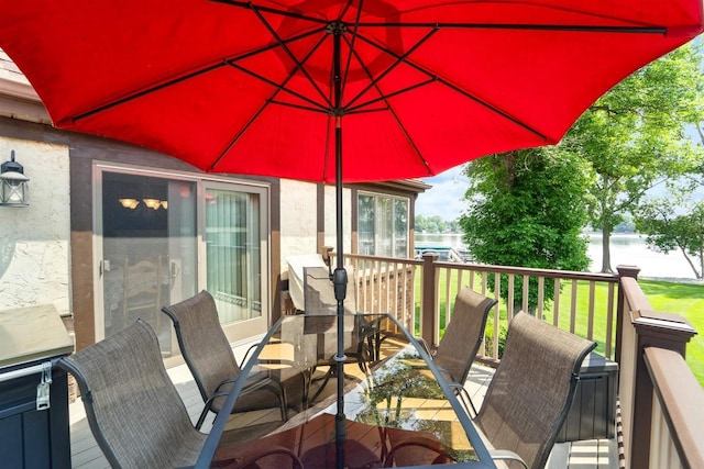 2213 Sunrise Dr, Appleton, WI 54914 - wooden deck with a water view and outdoor dining space
