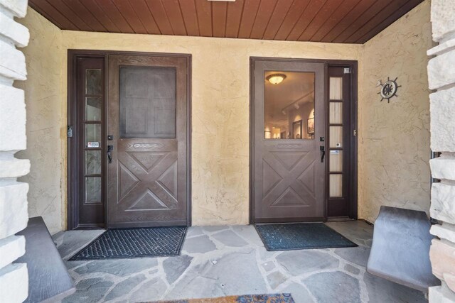 2213 Sunrise Dr, Appleton, WI 54914 - view of exterior entry featuring stucco siding