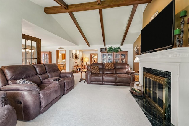 2213 Sunrise Dr, Appleton, WI 54914 - living area with carpet floors, beamed ceiling, a premium fireplace, and high vaulted ceiling