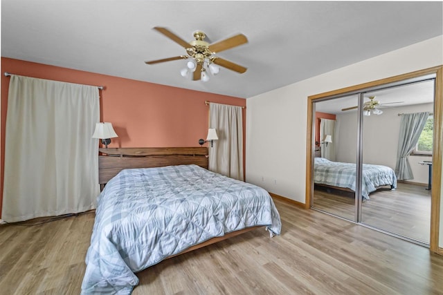 15 Naylor Cir, Madison, WI 53719 - bedroom with wood finished floors, a ceiling fan, and a closet
