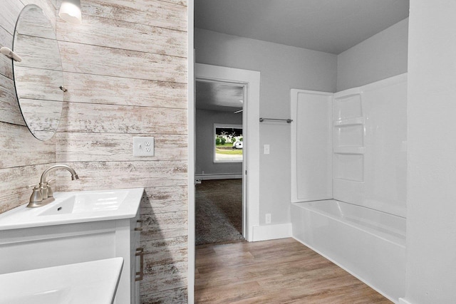 206 W Willow St, Bear Creek, WI 54922 - bathroom featuring vanity, wood finished floors, and shower / tub combination