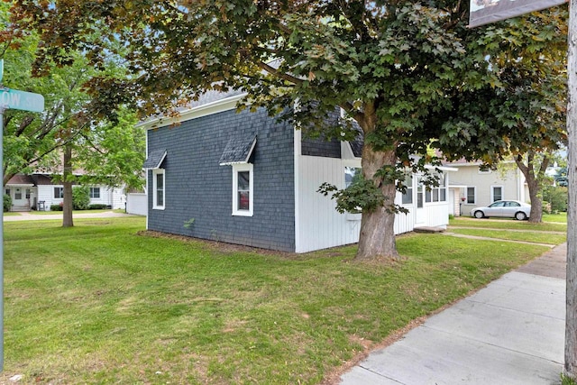 206 W Willow St, Bear Creek, WI 54922 - view of home's exterior featuring a lawn