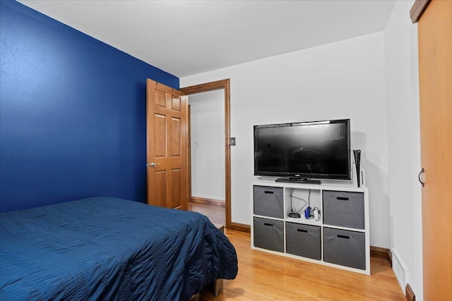 1918 Wilson Ave, Sheboygan, WI 53081 - bedroom featuring wood finished floors and baseboards