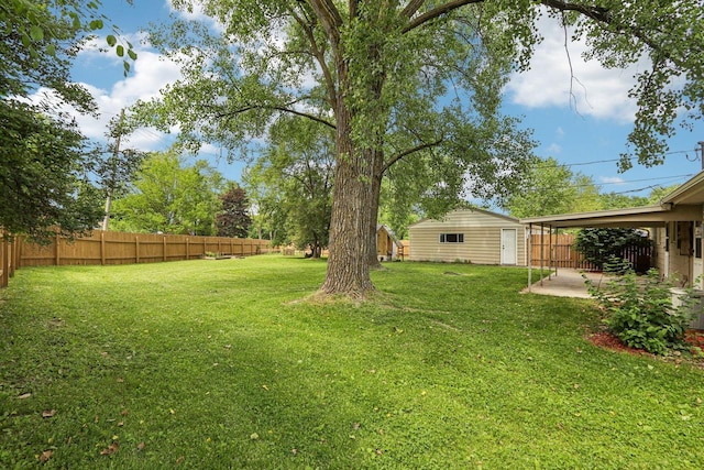 14516 W Janice Pl, New Berlin, WI 53151 - fenced backyard with an outdoor structure and a patio