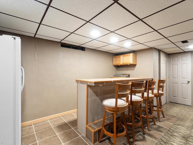 328 W Wilson St, Valders, WI 54245 - indoor bar featuring freestanding refrigerator, a drop ceiling, and recessed lighting