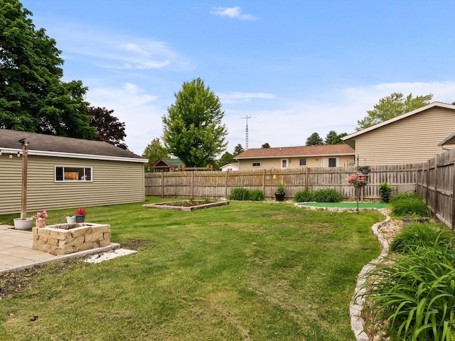 328 W Wilson St, Valders, WI 54245 - fenced backyard with a garden and a patio area