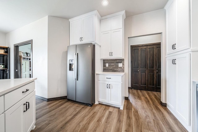 5090 N Milkweed Trl, Appleton, WI 54913 - kitchen with stainless steel fridge, light wood-style floors, light countertops, and recessed lighting
