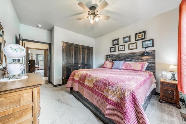 5090 N Milkweed Trl, Appleton, WI 54913 - bedroom with light carpet, a closet, and a ceiling fan