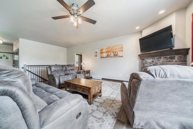 5090 N Milkweed Trl, Appleton, WI 54913 - living room with wood finished floors, a ceiling fan, and recessed lighting