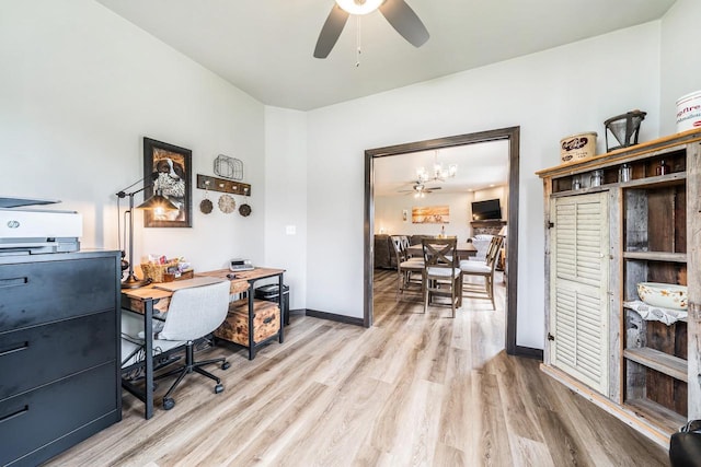 5090 N Milkweed Trl, Appleton, WI 54913 - office space featuring a ceiling fan, light wood-style flooring, and a chandelier