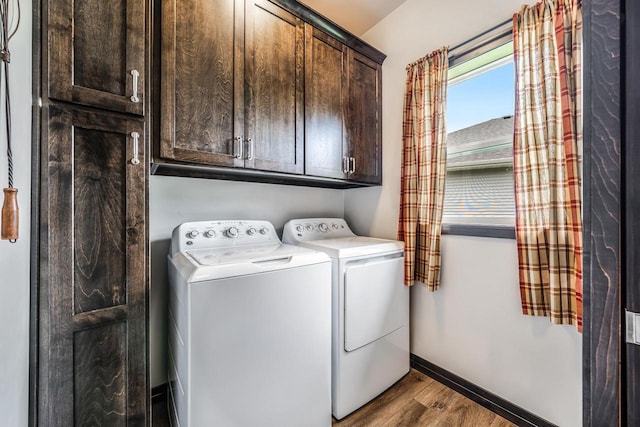 5090 N Milkweed Trl, Appleton, WI 54913 - washroom with independent washer and dryer, cabinet space, and dark wood-style floors