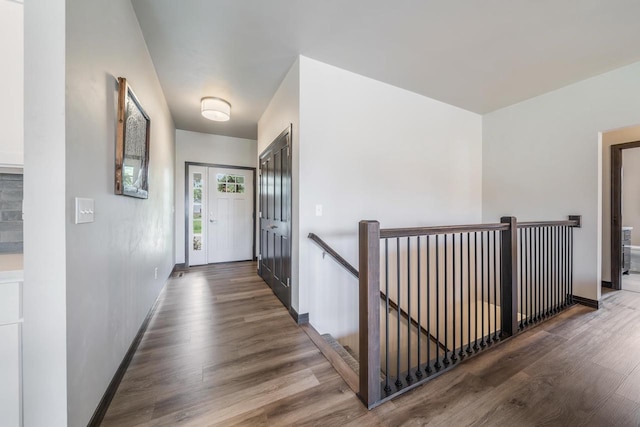 5090 N Milkweed Trl, Appleton, WI 54913 - hallway with an upstairs landing and wood finished floors