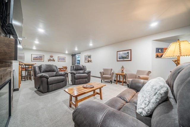 5090 N Milkweed Trl, Appleton, WI 54913 - carpeted living room with recessed lighting and a glass covered fireplace