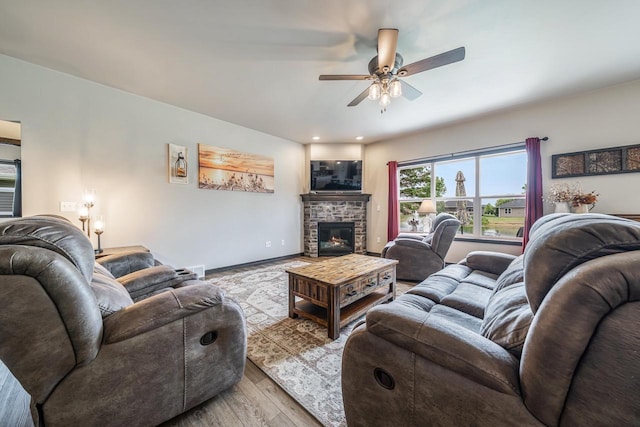 5090 N Milkweed Trl, Appleton, WI 54913 - living room featuring ceiling fan, wood finished floors, and a glass covered fireplace