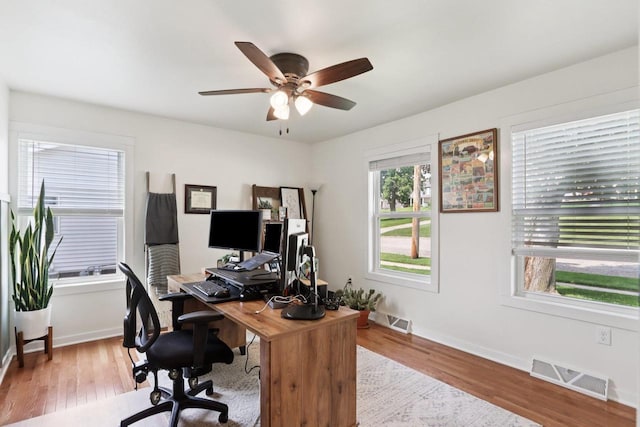 228 N Pleasant Ave, Jefferson, WI 53549 - office area with wood finished floors and a ceiling fan