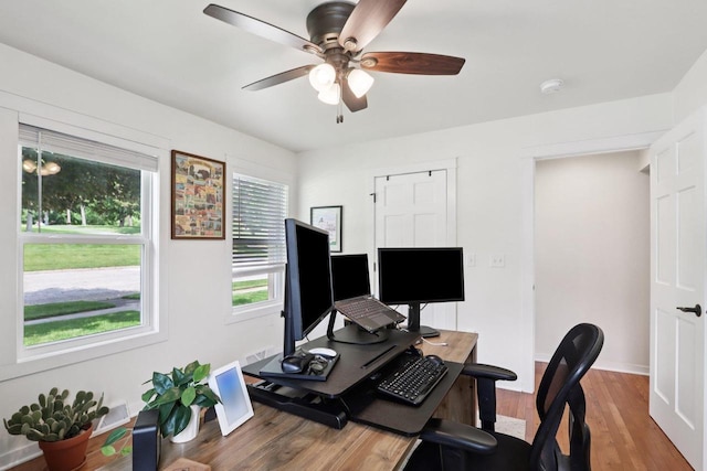 228 N Pleasant Ave, Jefferson, WI 53549 - office featuring a ceiling fan and wood finished floors