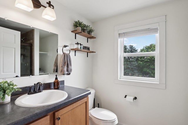 228 N Pleasant Ave, Jefferson, WI 53549 - bathroom with toilet and vanity