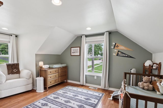 228 N Pleasant Ave, Jefferson, WI 53549 - bedroom featuring wood finished floors, lofted ceiling, and recessed lighting