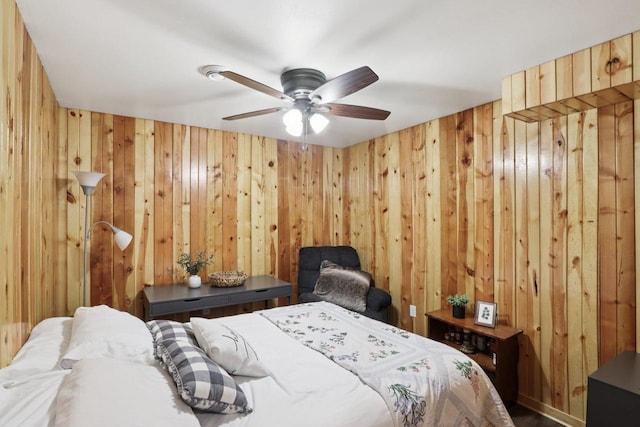 228 N Pleasant Ave, Jefferson, WI 53549 - bedroom with wooden walls and a ceiling fan
