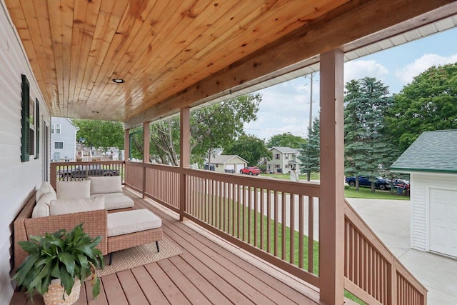 228 N Pleasant Ave, Jefferson, WI 53549 - wooden terrace featuring outdoor lounge area and a residential view
