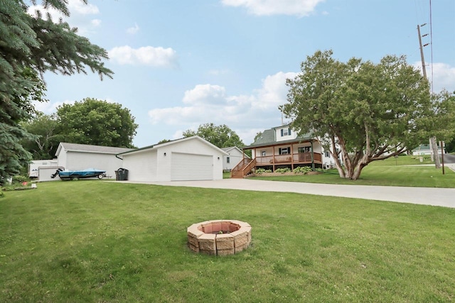 228 N Pleasant Ave, Jefferson, WI 53549 - view of front facade featuring a front yard, an outdoor fire pit, and a porch