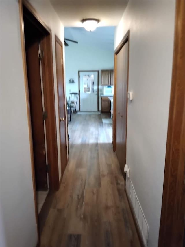 W5211 Fern Ave, Montello, WI 53949 - hallway featuring wood finished floors