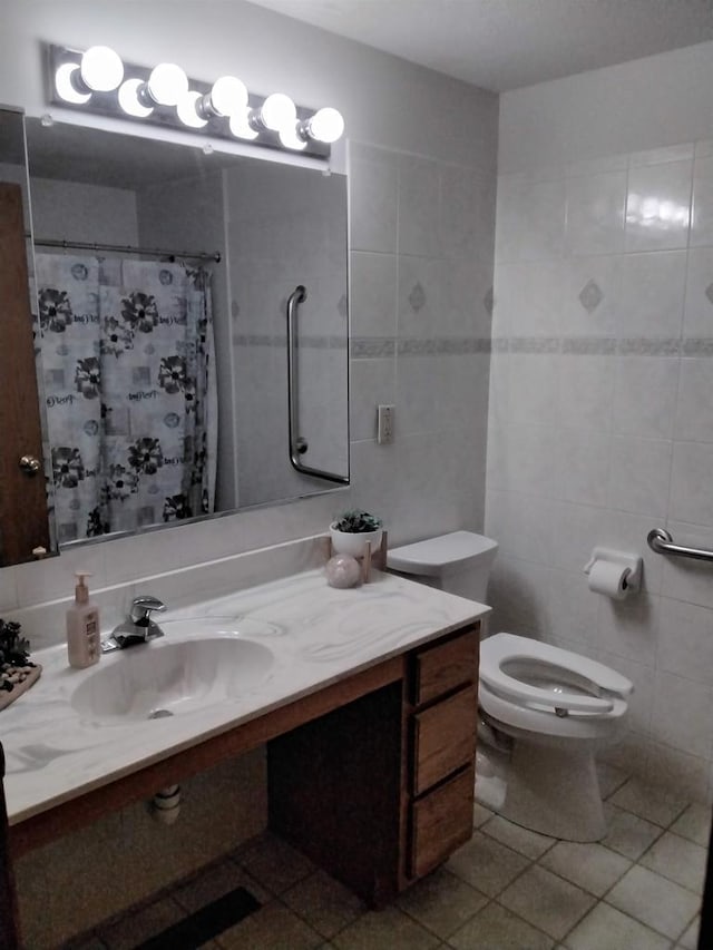 W5211 Fern Ave, Montello, WI 53949 - bathroom featuring tile walls, vanity, tile patterned flooring, and curtained shower